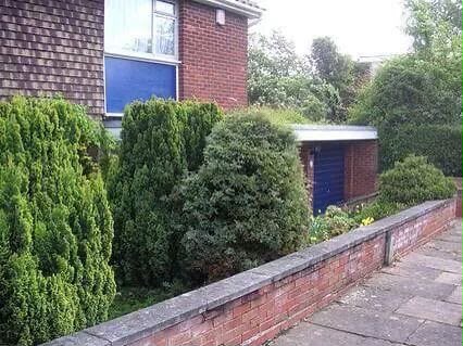 Brick garden wall with detailed coping stones built in a North East garden